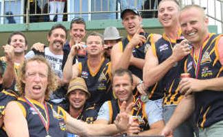Kicking back: Summerland AFL champions Tweed Coast Tigers enjoy ‘Mad Monday’ celebrations at the Murwillumbah races. Kicking back: Summerland AFL champions Tweed Coast Tigers enjoy ‘Mad Monday’ celebrations at the Murwillumbah races.